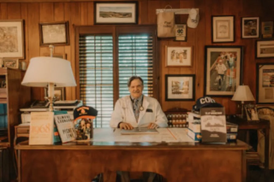 Olaf Kroneman, M.D. in his study